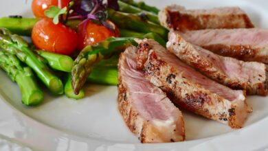 Grilled Meat Dish Served on White Plate